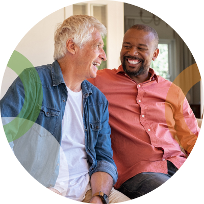 Two men smiling